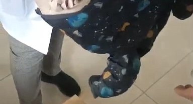 Elazığ'da dilencinin parayı sakladığı yer pes dedirtti, bebek montundan bin 200 lira çıktı