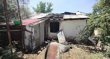 Yaşlı kadını yangından komşusu kurtardı